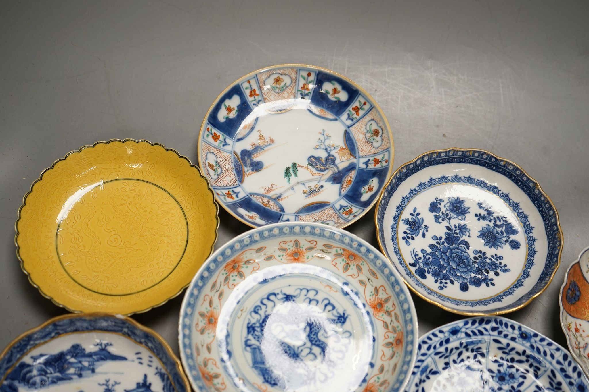 Ten various Chinese porcelain saucer dishes, largest 15cm